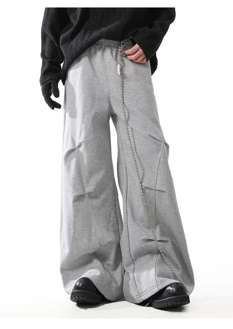 STRUCTURED PLEAT BAGGY SWEAT PANTS