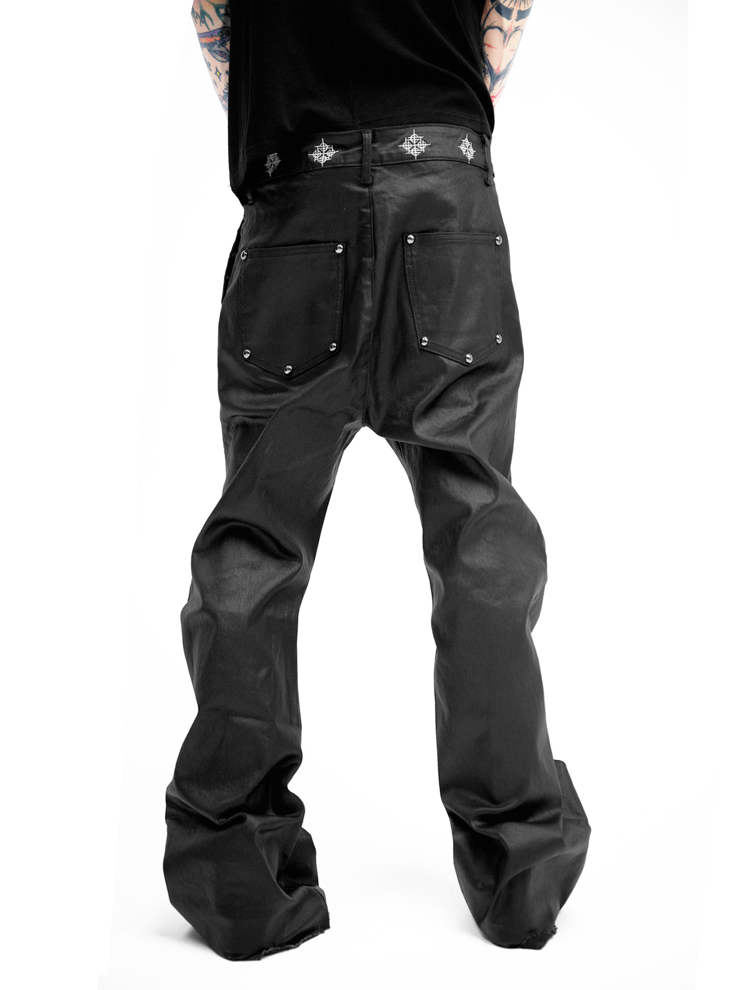 COATED BLACK DENIM FLARE TROUSERS