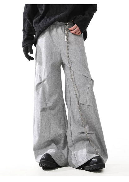 STRUCTURED PLEAT BAGGY SWEAT PANTS