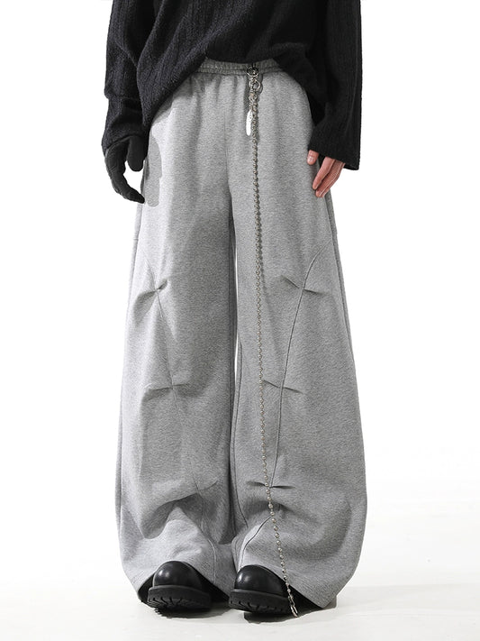 STRUCTURED PLEAT BAGGY SWEAT PANTS