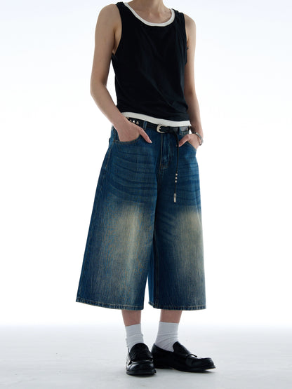 DISTRESSED WASHED DENIM SHORTS