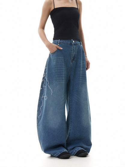 BACK PRINT LIGHTNING WASH DISTRESSED BAGGY DENIM PANTS