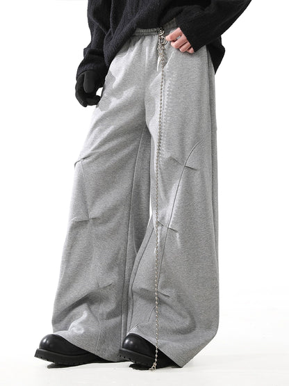 STRUCTURED PLEAT BAGGY SWEAT PANTS